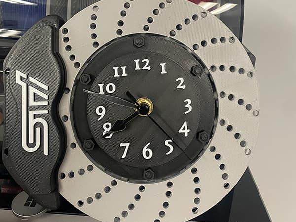 Custom 3D printed wheel rotor and brake caliper assembly clock